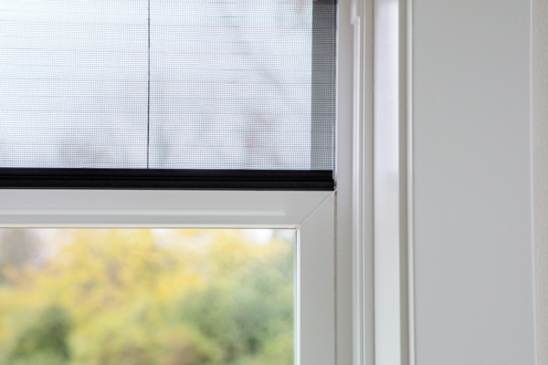 Close-up of open 250 Series double-hung window featuring the Hidden Screen