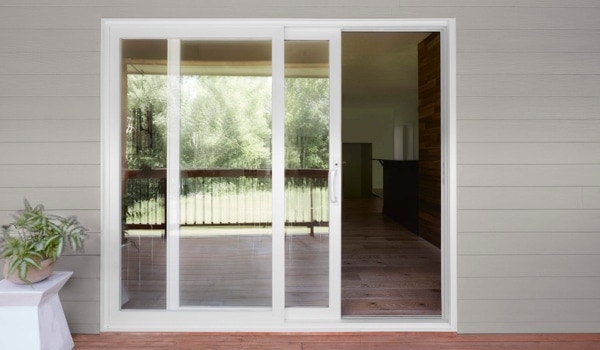 White sliding glass door opened up to indoors