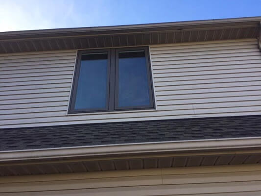 after image of cleveland home with new wood casement windows