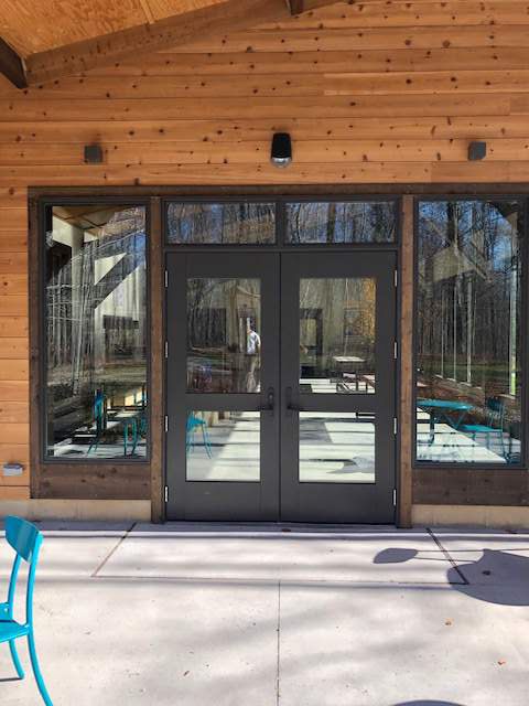 Double hinged French patio door made of wood