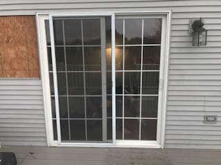 Exterior view of old sliding glass door