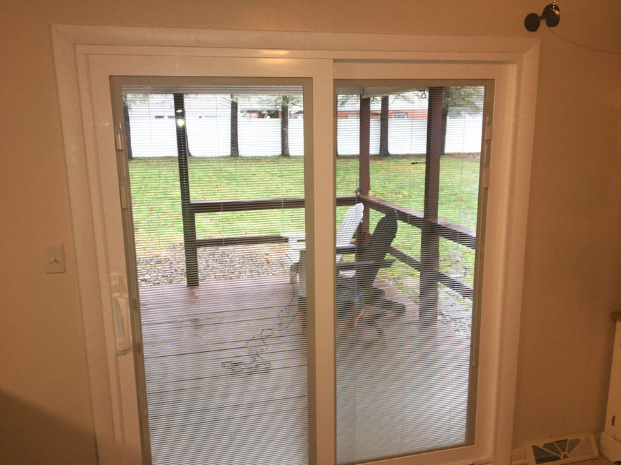 New white vinyl sliding patio door in Erie, PA, home