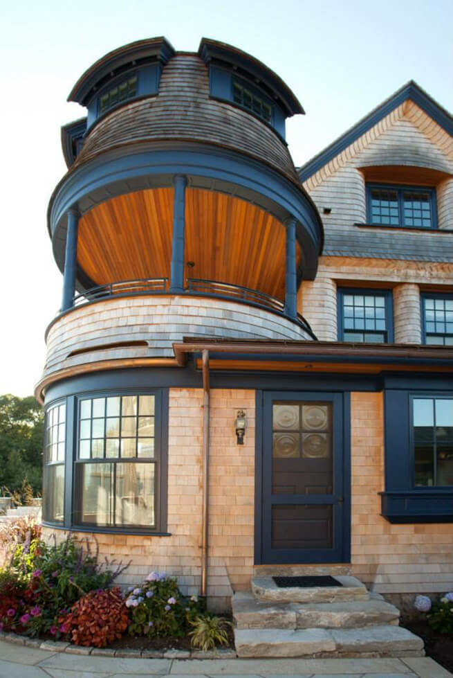 Side entry door and curved windows on waterfront residence on the South Coast of Rhode Island