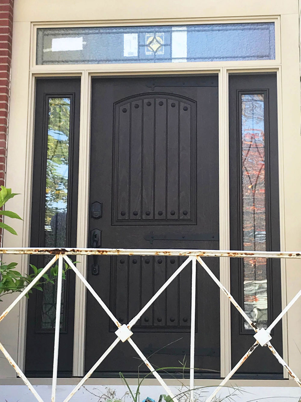 Vorheers home after installation of Pella dark mahogany entry door with Stella glass
