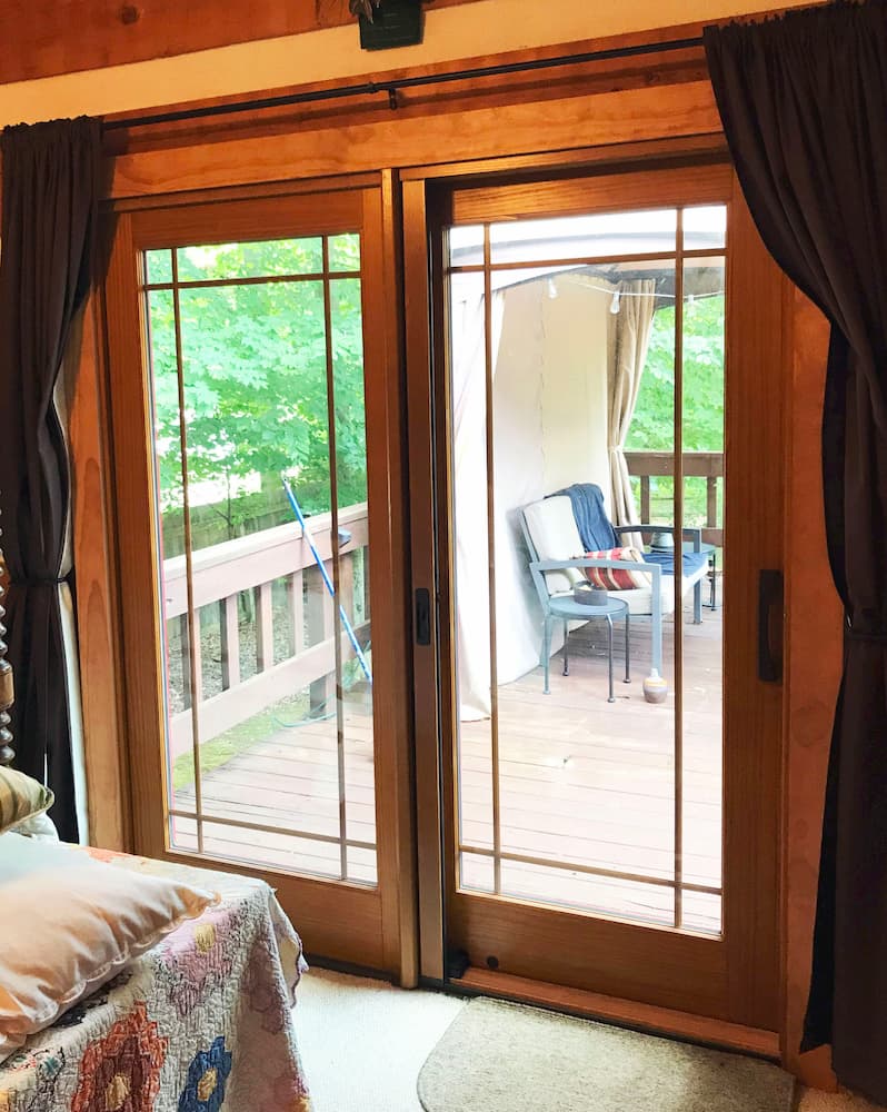 Interior view of wood sliding patio door with prairie-style grille pattern