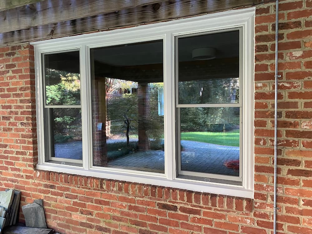 Double-hung wood windows on Henrico home