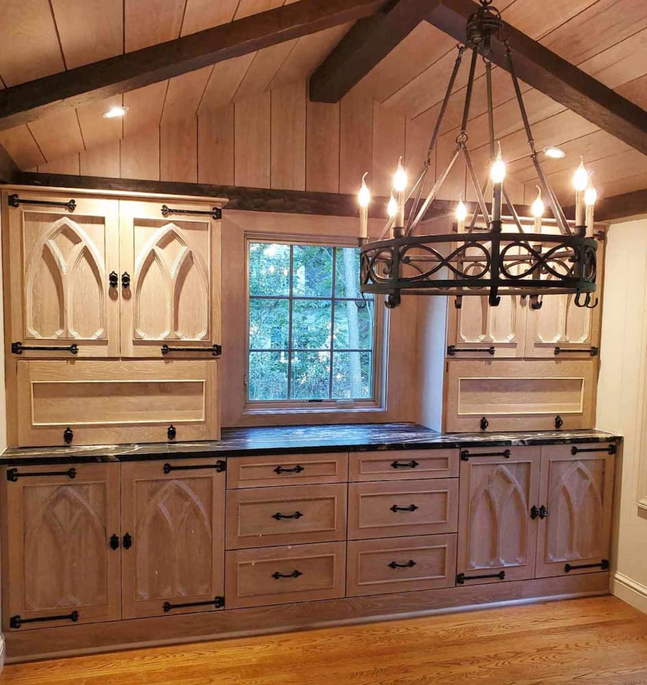 Wood kitchen with new wood casement window with traditional grille pattern