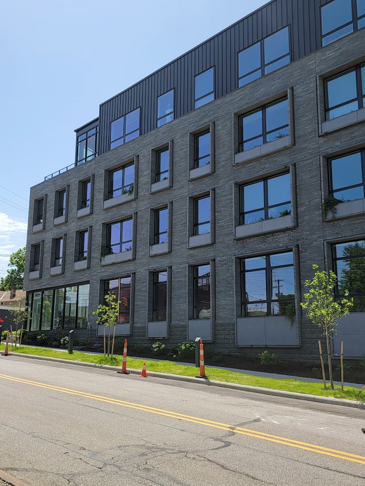 Black fiberglass picture and awning windows on new Cleveland apartments