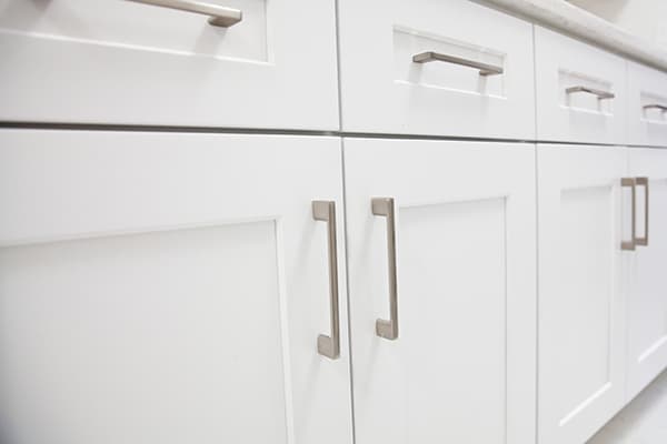 White shaker-style cabinets