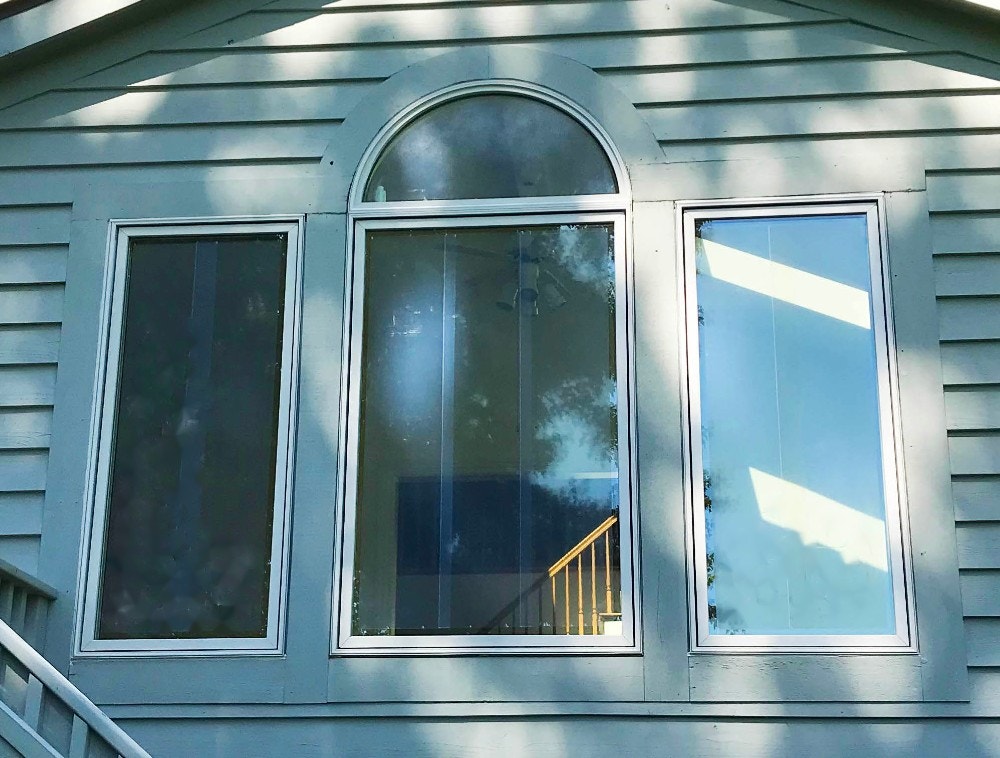 Exterior view of three new wood fixed windows