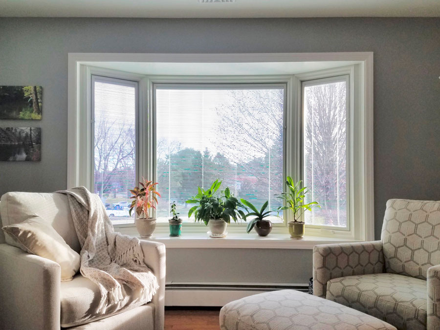 New wood bay window with white trim in Coatesville, PA, home