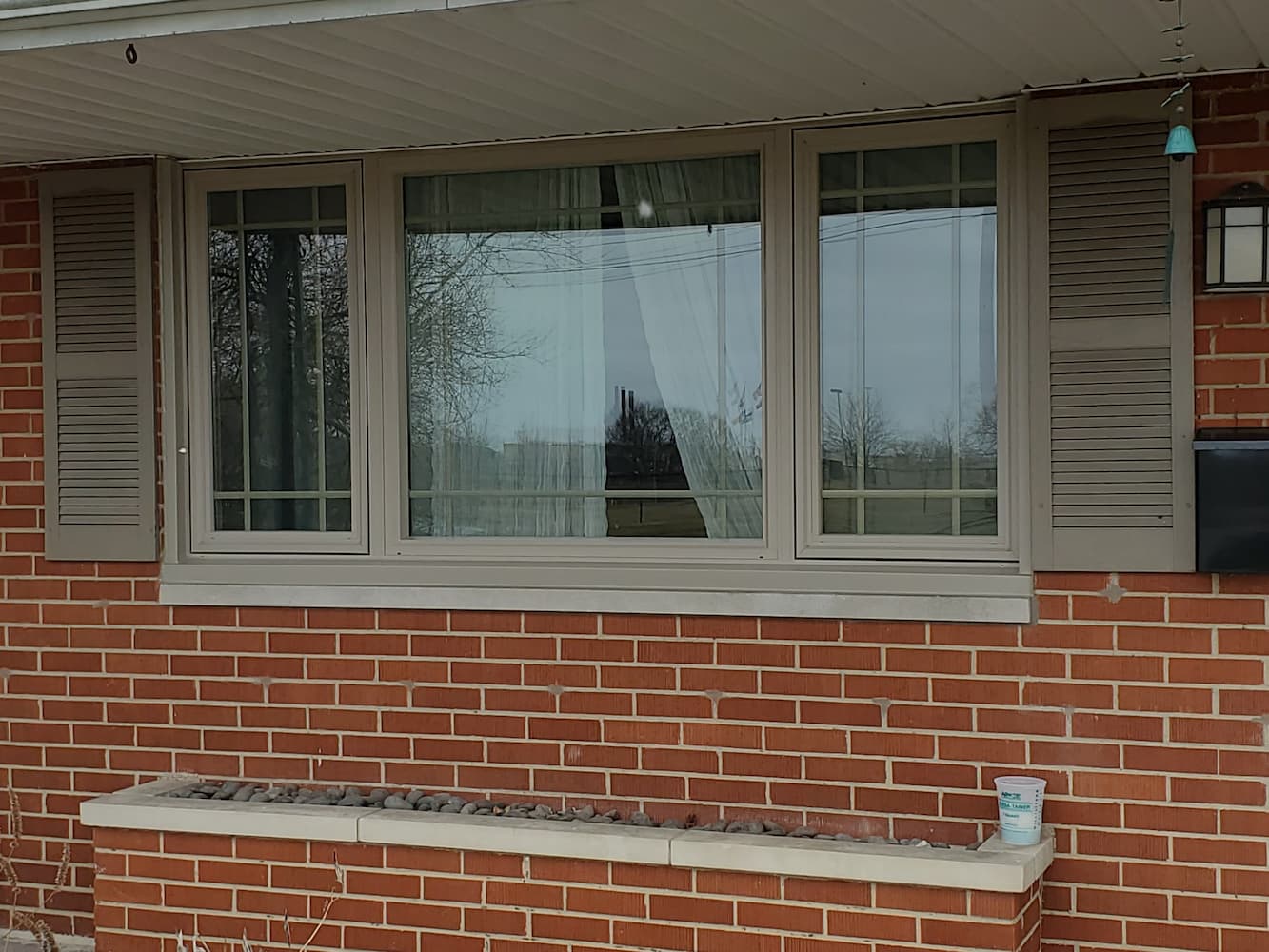After exterior shot of new Pella windows on front of Kettering home