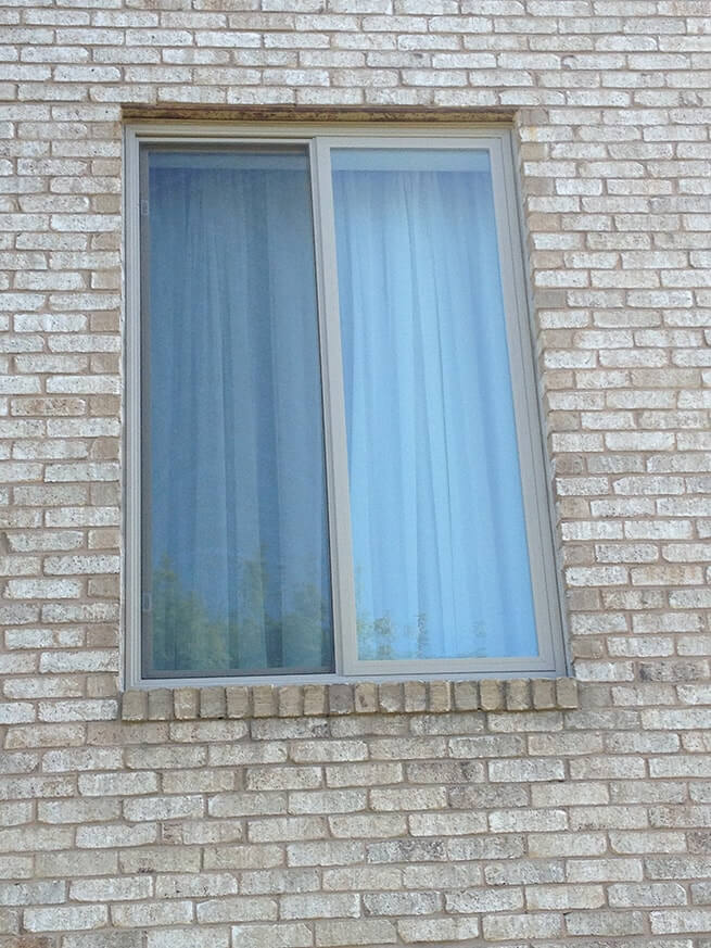Fiberglass sliding window on Valley View Condos