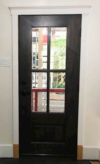 Interior view of new 3/4 light wood entry door