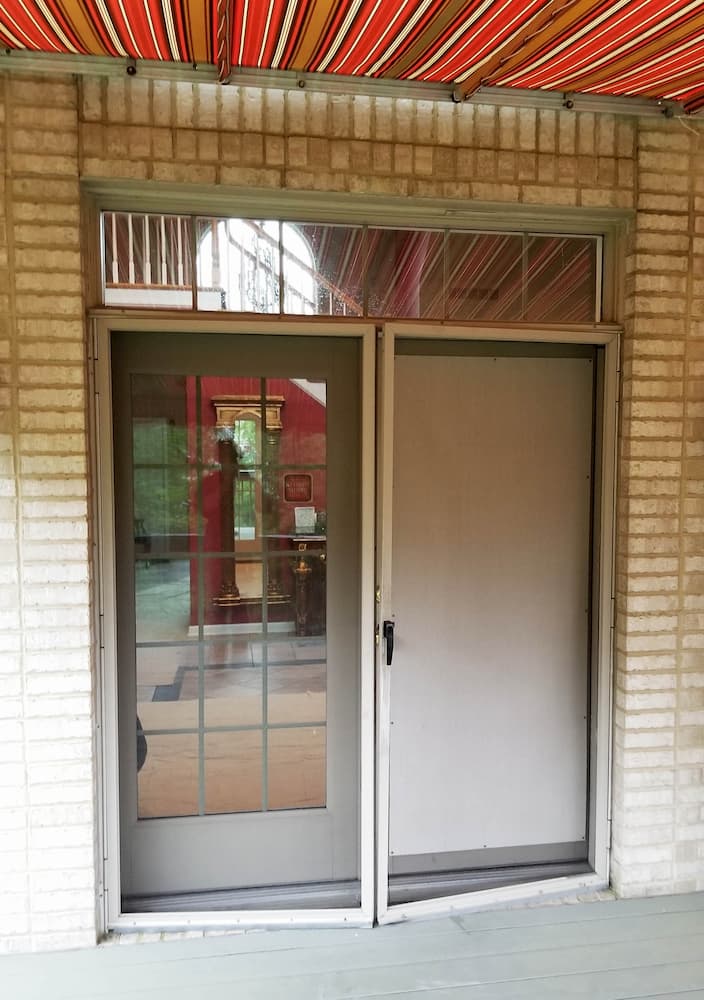 Exterior view of old hinged patio door on Murrysville, Pennsylvania, home