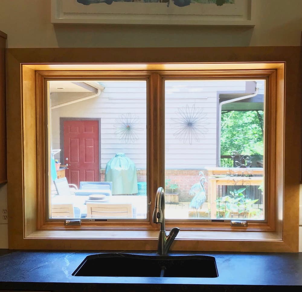 Interior view of new wood casement windows over kitchen sink