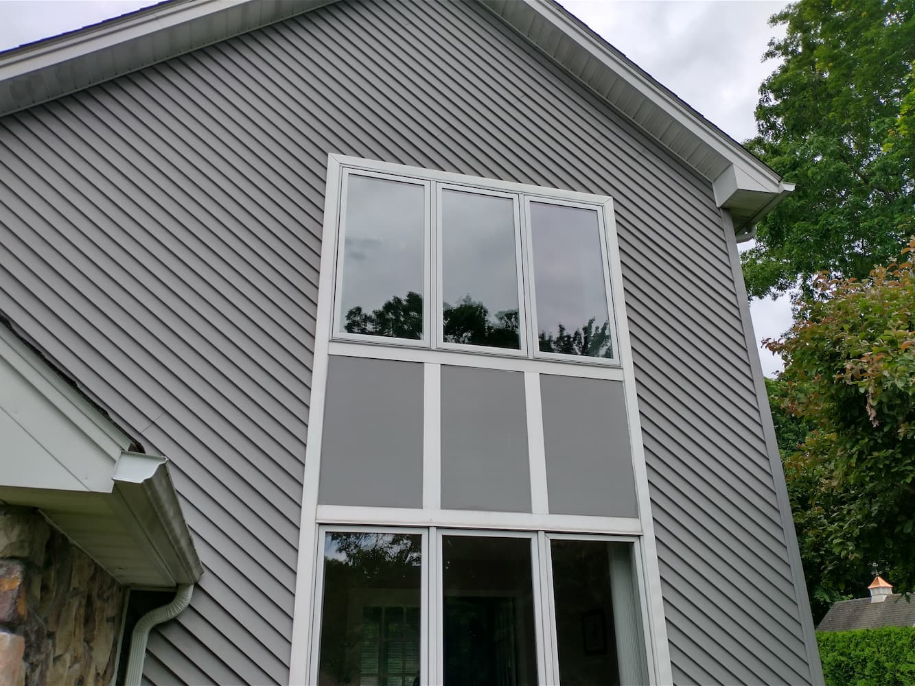 After exterior view of Ludlow home's existing windows