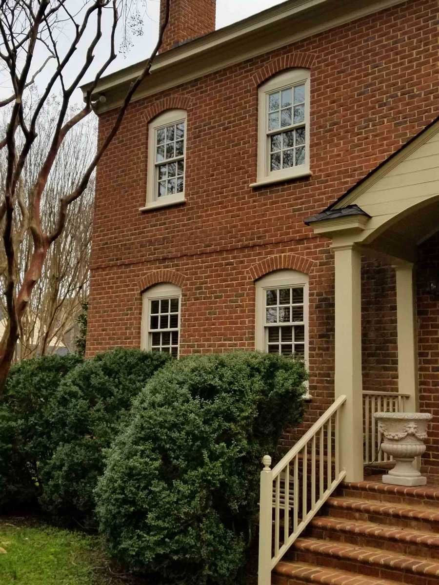 Front steps of brick home in Henrico, VA, after whole-home window replacement