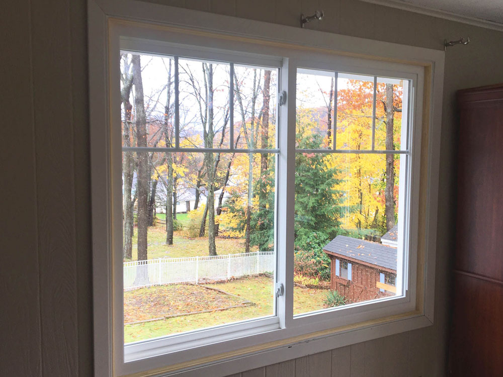Interior of new Pella 250 Series vinyl double-hung window on Conneaut Lake home