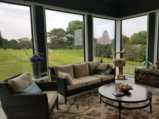 sunroom view of waterloo home with new fiberglass casement windows
