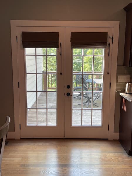 Double white back door with grilles before replacement