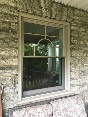 after image of philadelphia home with new wood double hung windows