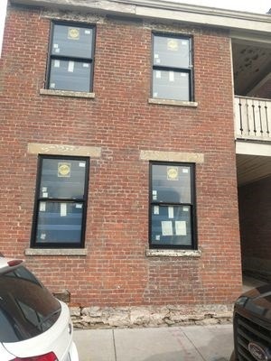 wood double-hung window replacement on historic building renovation
