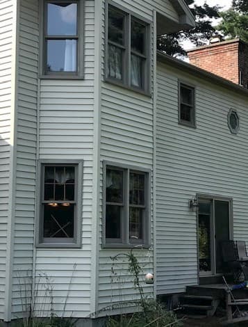 Exterior view of home with old windows