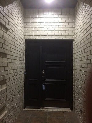 Brick home with entryway door