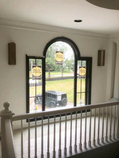Interior view of fixed black fiberglass windows