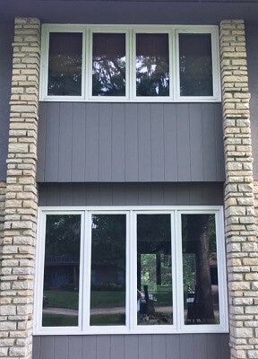 before image of columbus home with new wood casement windows