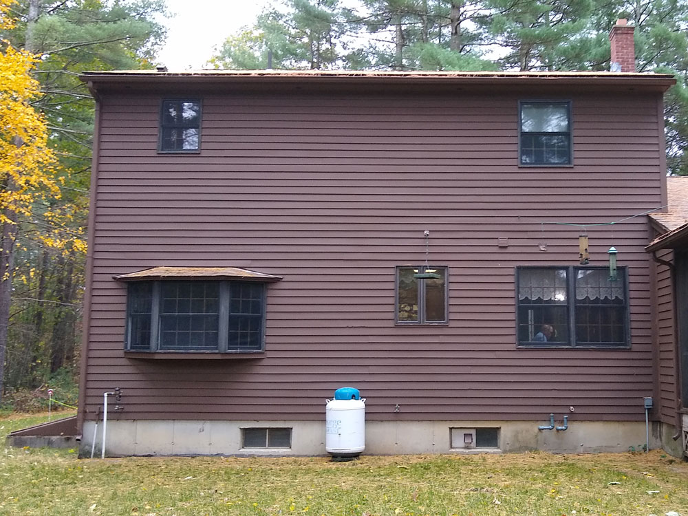 Exterior of back of Southampton, MA, home before whole-home window replacement