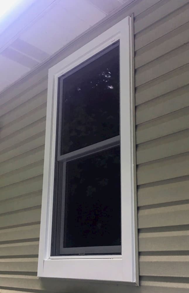 Exterior view of new wood double-hung window