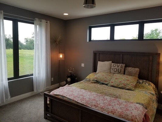 bedroom view of waterloo home with new fiberglass casement windows