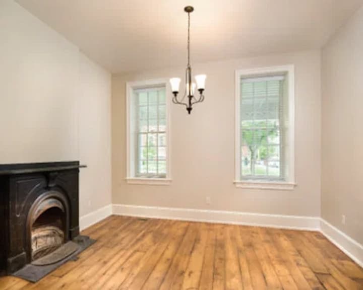 Interior view of white double-hung windows in white living room