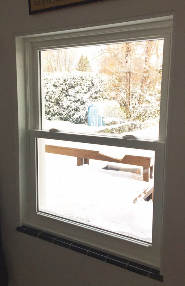 Interior view of new white vinyl double-hung window
