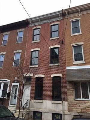 after image of new philadelphia townhome that gets new double hung windows