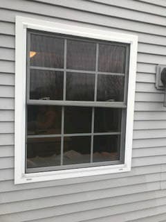 Exterior view of old double-hung window