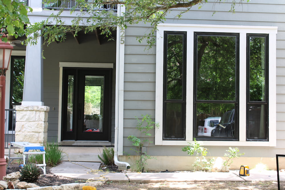 Front of Austin home with new Pella Impervia fiberglass door and windows