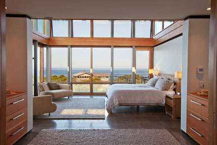 Glass walls in bedroom of Outermost House made with Architect Series wood windows