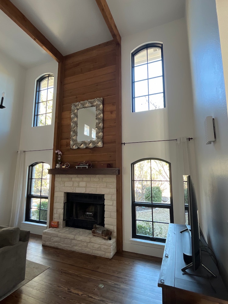 Austin home foyer with new special shape, picture and double-hung windows