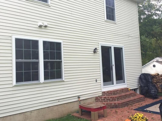 back after image of philadelphia home with new vinyl double hung windows and doors