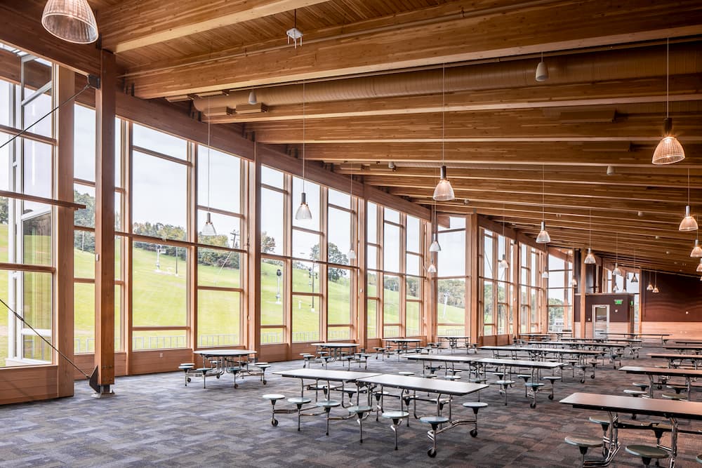 Hyland Hills Chalet floor-to-ceiling windows alternate interior facility view