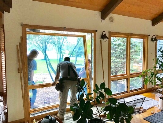 installation of new wood picture window