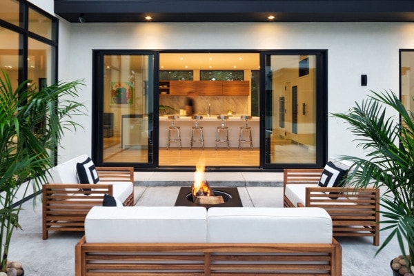 houseplants featured in a clean and sleek outdoor patio space
