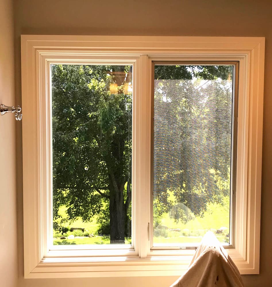 Interior view of new wood side-by-side casement windows