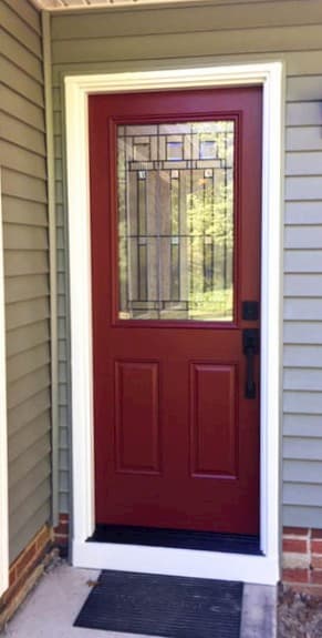 New red fiberglass entry door with art glass