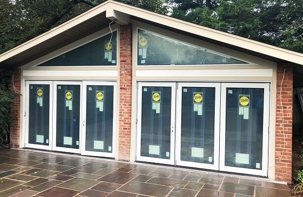 custom pool house in princeton gets new bifold patio doors
