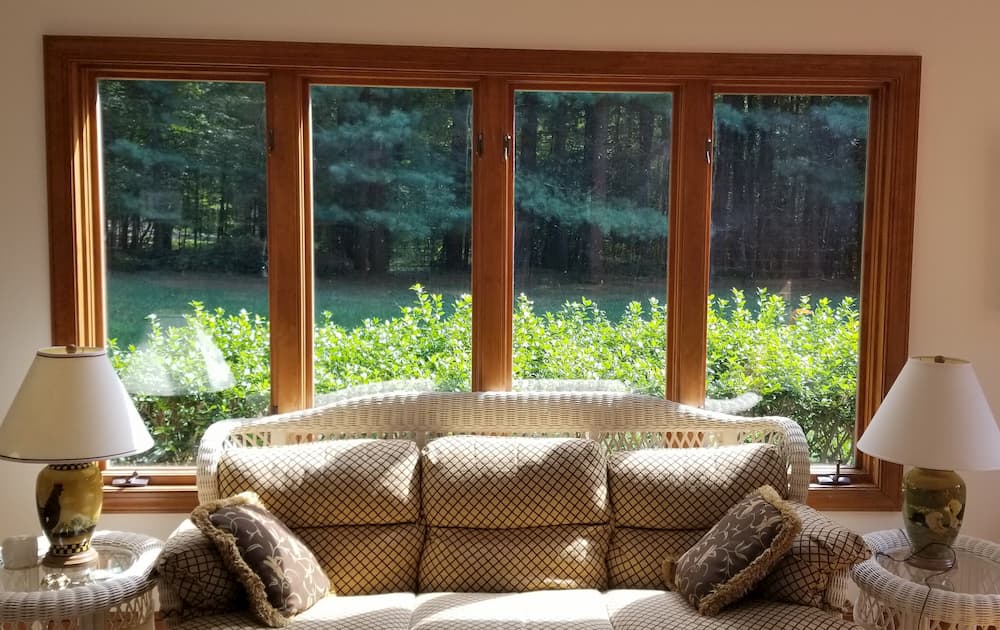 Interior view of four wood casement windows