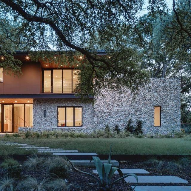 Front exterior shot of contemporary Austin home with new aluminum-clad wood windows